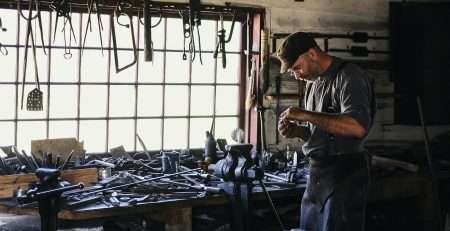 man inside tool shed